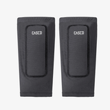 Cased low-profile shin protection for skiing is designed to eliminate shin pain and keep you comfortable all day.