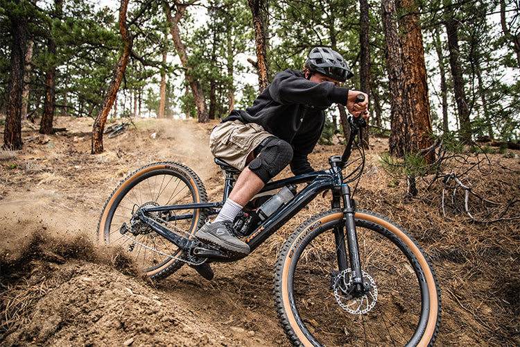 Cased protective gear like knee pads provide safety and comfort while riding.